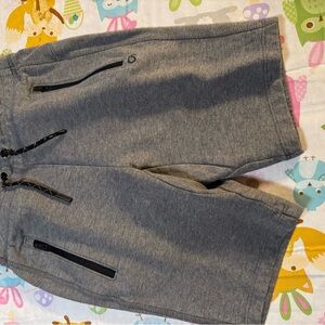 Gray Athletic Shorts with Black Zipper Accents